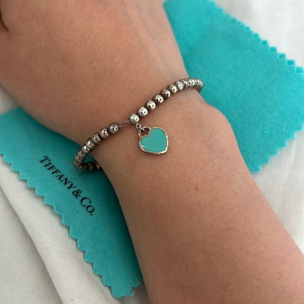 Authentic Tiffany’s Heart Bracelet . Complete with bag and polishing cloth.